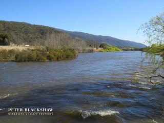 View across river towards block