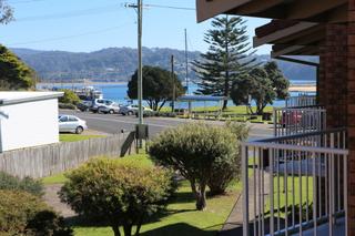 View to park, inlet and wharf from balcony