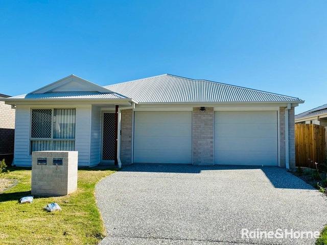 Coomera Waters - Raine & Horne Coomera