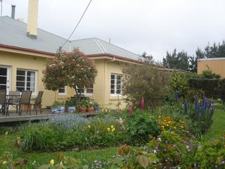 Kitchen, Sun-room and deck from western side