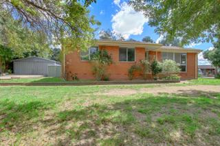 Front of home with double garage to side