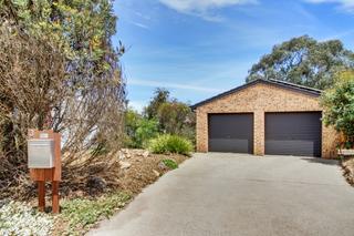 Front of property - discrete entrance to residence