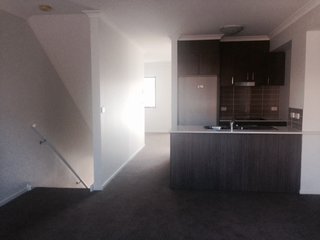 Kitchen to garage to lounge