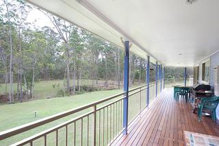 Covered deck under main roofline