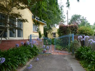 located at rear of residence