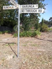 Street Sign in front of block