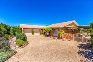 Front driveway to double garage and front of home 