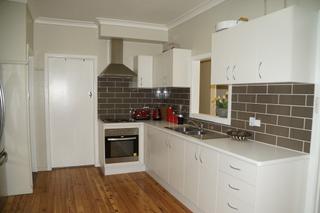 Renovated kitchen with stainless steel appliances