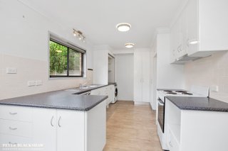 Kitchen with laundry facilities