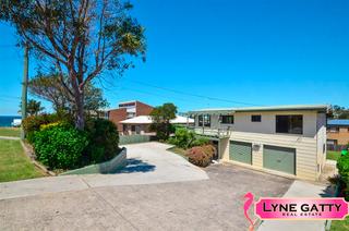 Front View - ocean at end of street