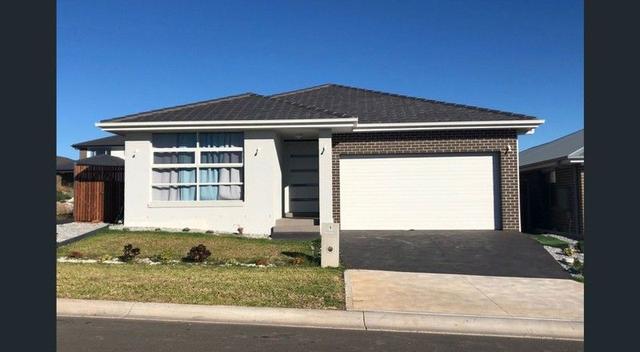 9 Rowan St, NSW 2570