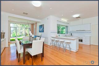 Family and Meals Area to Kitchen