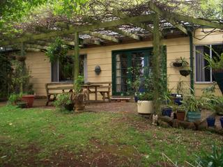 Front wisteria draped terrace