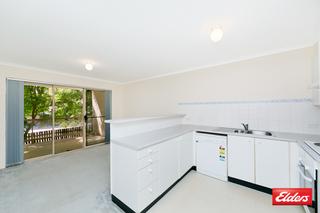 Kitchen toward Family & Balcony