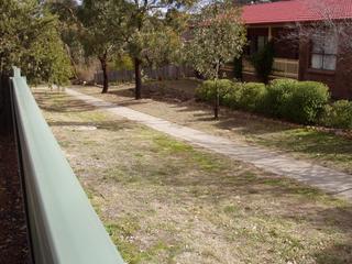 path behind fence